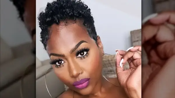 Woman with curly pixie