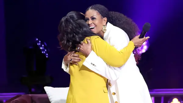 michelle obama hugging oprah in december 2022