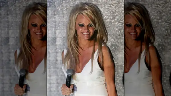 Pamela Anderson in a blond wig