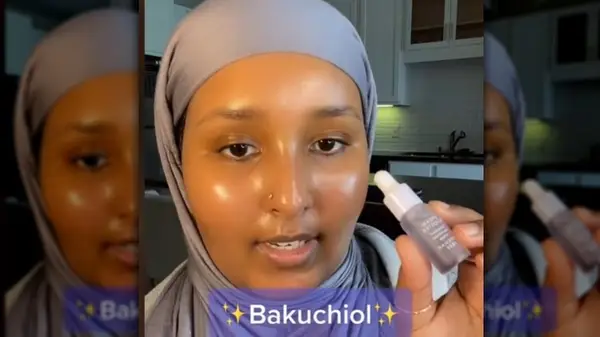 woman holding Bakuchiol product