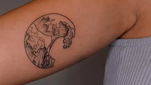 Circular wave tattoo