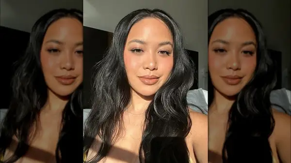 person with bronzed cheeks