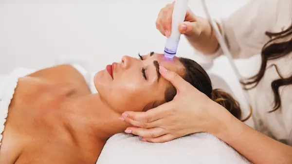 Woman receiving hydrafacial