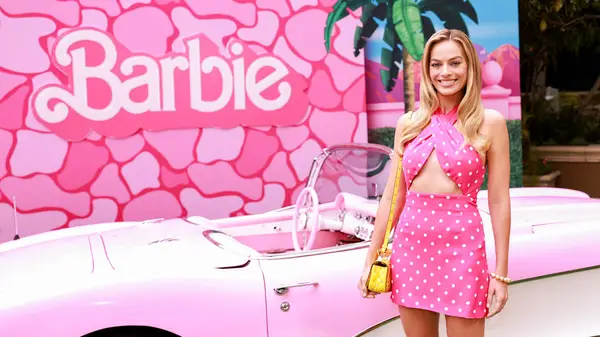Margot Robbie by Barbie car