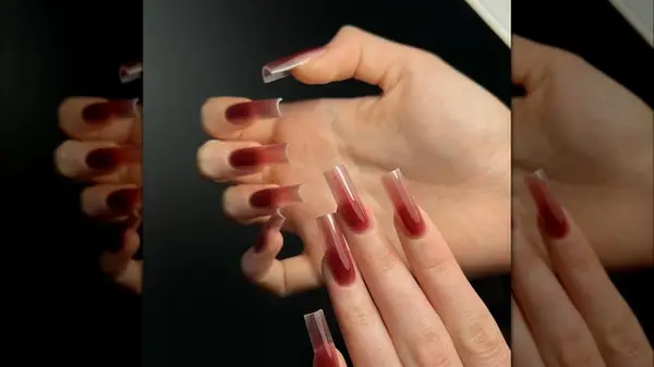Translucent red nails