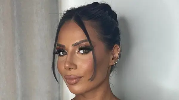 Woman with a sleek bun 