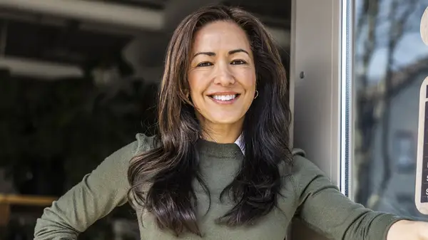 Woman with long layered hair