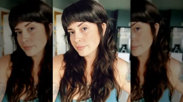 Woman with wide bangs