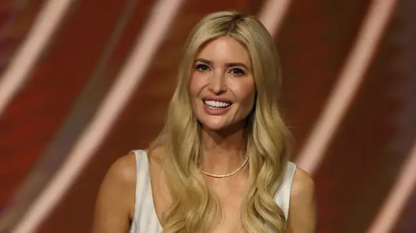 Ivanka Trump at an event in a white sleeveless dress