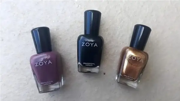 three nail polishes