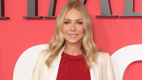 Kelly Ripa smiling on the red carpet