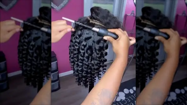 Person curling wig