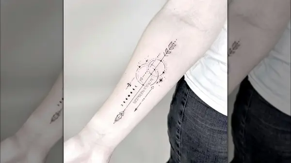 Coordinate with arrow and moon tattoo