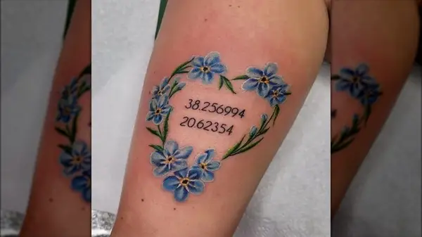 Coordinates inside flower heart tattoo