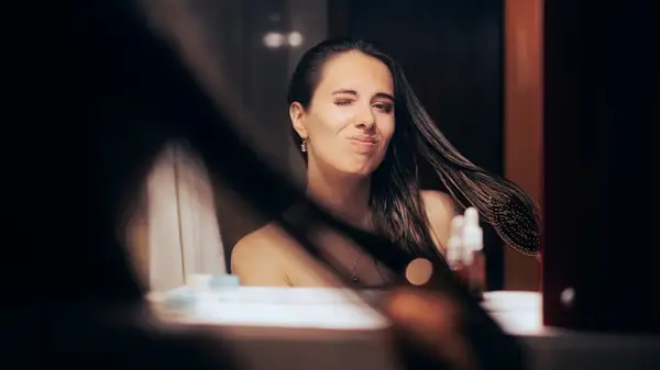 Woman brushing her hair