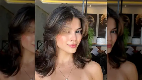 A woman on Instagram with a butterfly bob