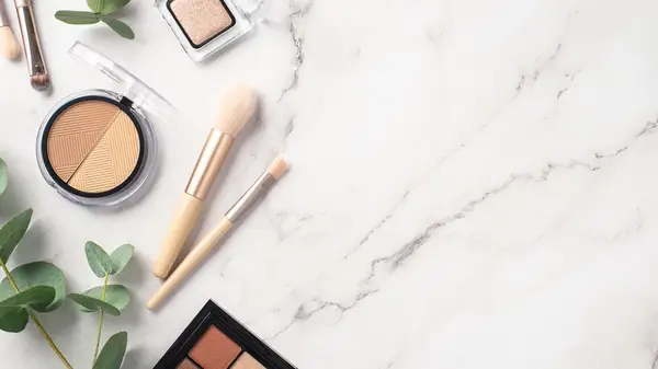 Contouring makeup powder with brushes on side