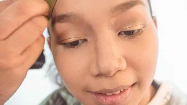 Girl with contour lines on nose