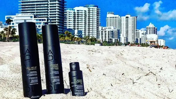 Laid Brand products in the sand