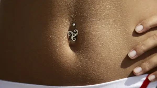A bellybutton charm