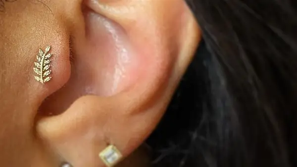 A tragus piercing
