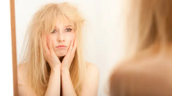 Woman with frizzy hair