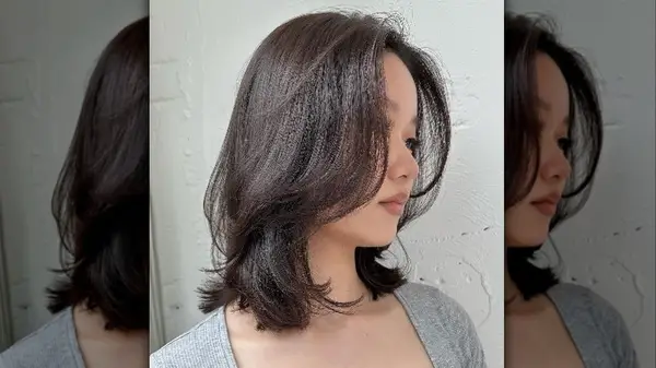 Woman with short butterfly haircut