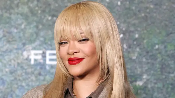 Rihanna wearing leopard print coat