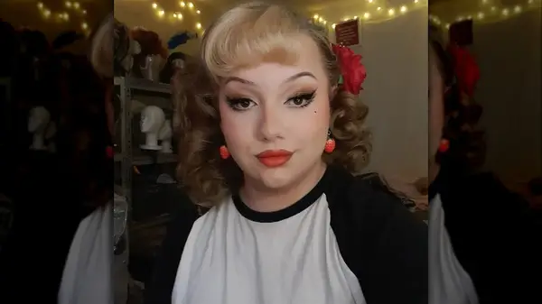 Woman with sideswept vintage bangs