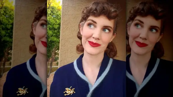 Woman with curled micro-bangs