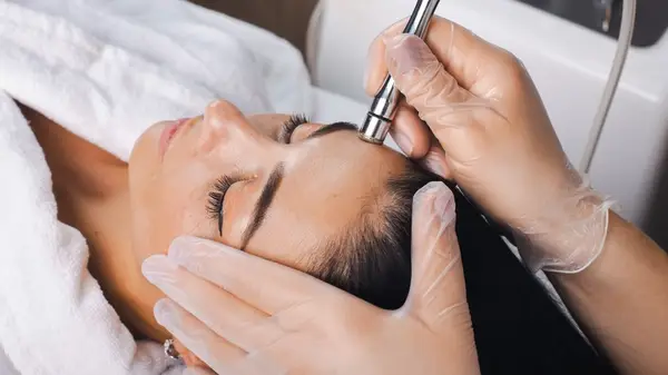 Woman getting facial