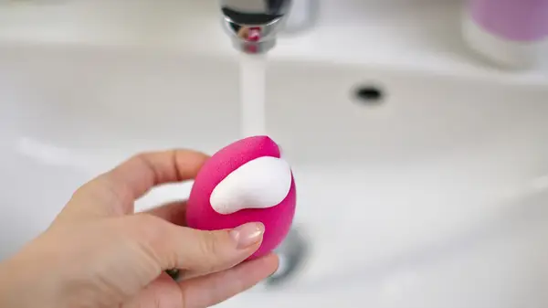 beauty sponge under running water