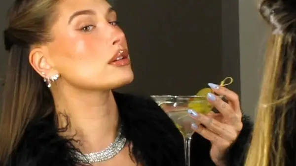 Hailey Bieber with olive nails