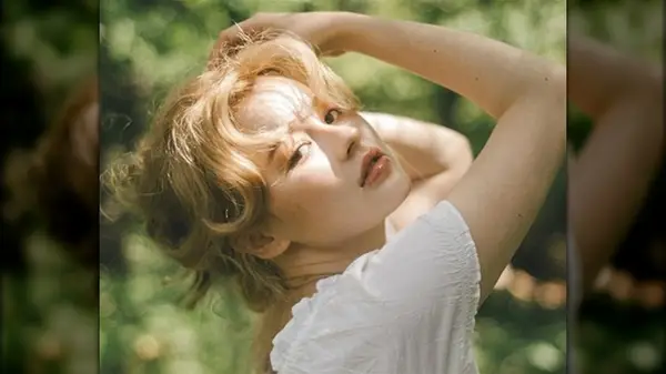 Woman embodying tomato girl aesthetic