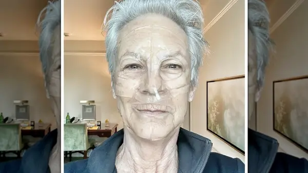 Selfie of Jamie Lee Curtis wearing a translucent face mask