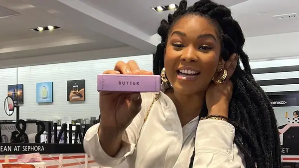 Christina Funke Tegbe holding her product