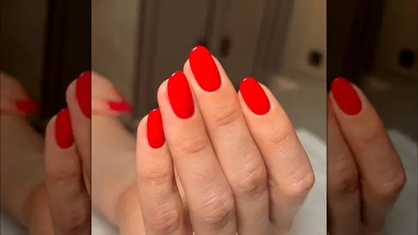 Glossy red manicure