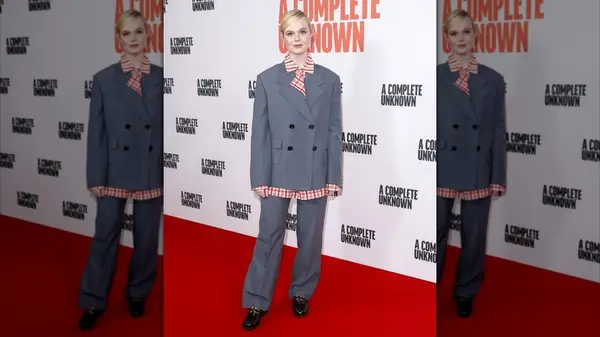 Elle Fanning in a double-breasted suit