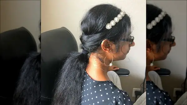 Woman with a ponytail and headband