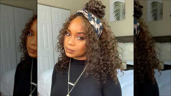 Woman with a topknot and headband