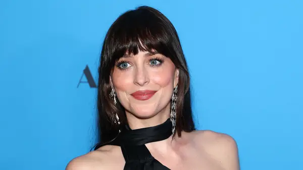 Dakota Johnson on the red carpet with her hair worn down