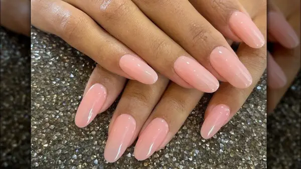Gel manicure with light pink polish