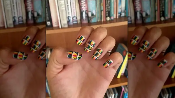 abstract book-themed manicure