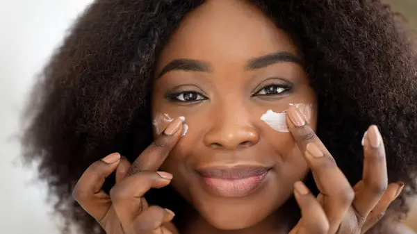 Applying moisturizer