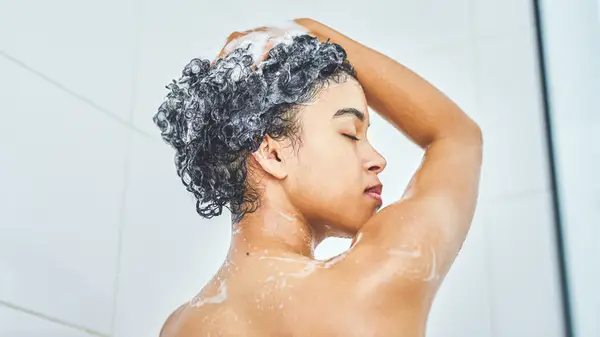 Woman washing her hair