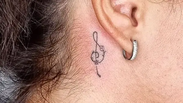 Musical note tattoo