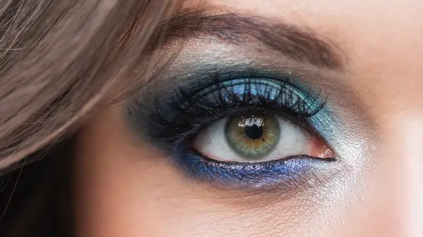 Woman wearing blue eyeshadow