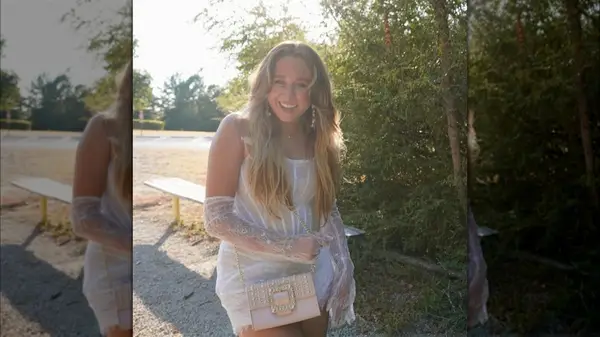 Woman with long curtain bangs
