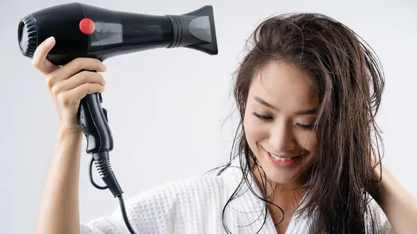 Using blow dryer