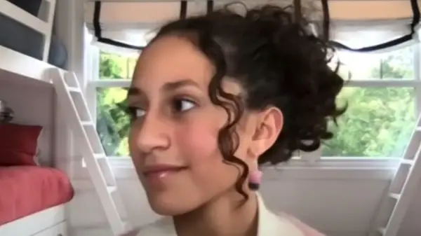 Emme Muniz with a curly updo